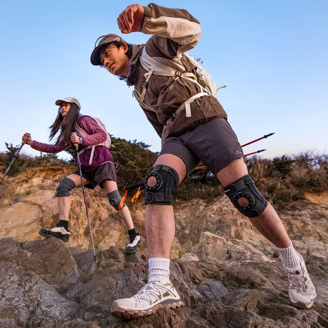 Бандаж на коліно туристичний з пружинною підтримкою Naturehike Qingyue CNK2650DS010, чорний — Photo 1